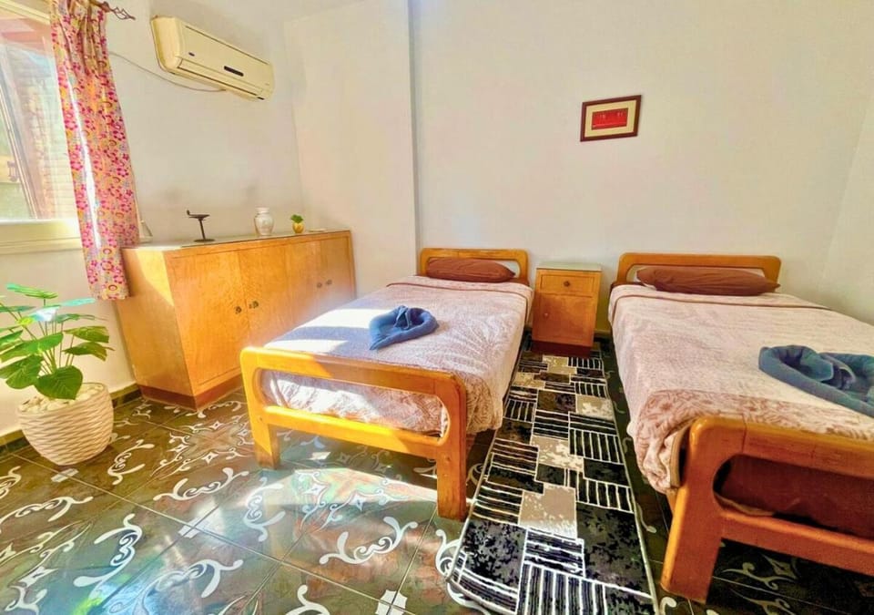 Bed, Photo of the whole room, Bedroom, towels, air conditioner