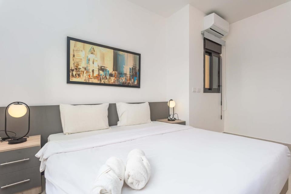 Bed, Photo of the whole room, Bedroom, hair dryier, towels, wardrobe, air conditioner