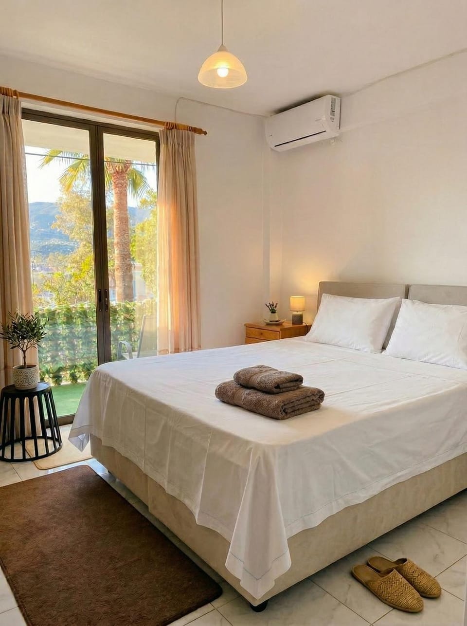 Bed, Photo of the whole room, Bedroom, towels, air conditioner