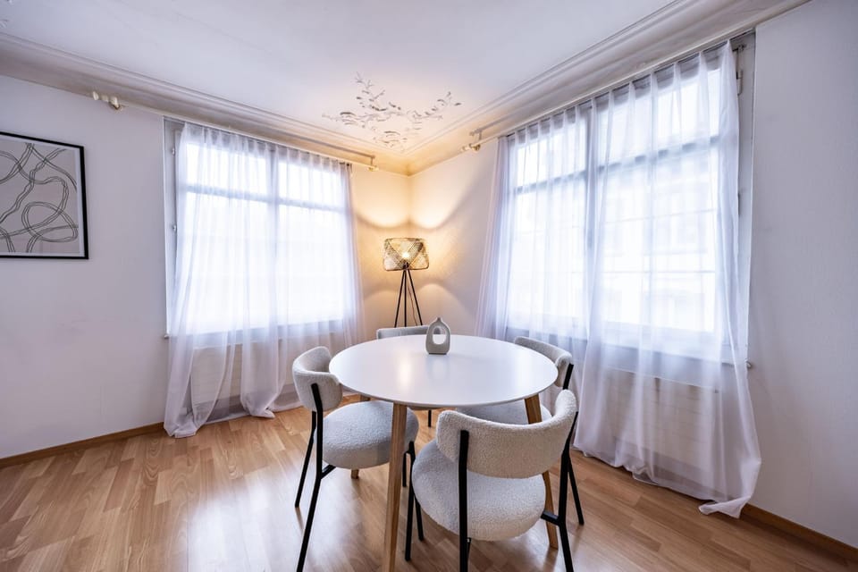 Property building, Living room, Seating area, Dining area, furniture