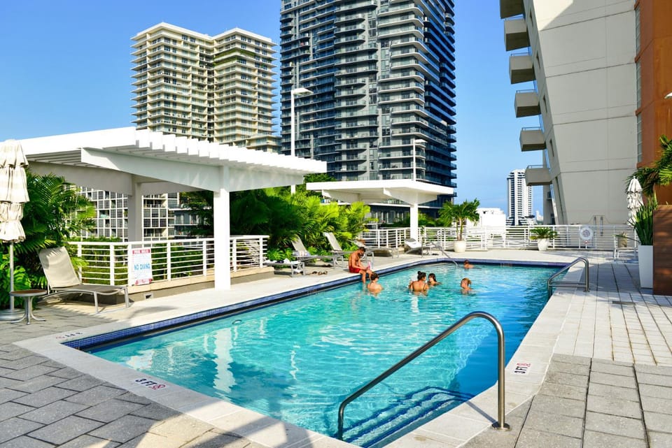 Property building, Pool view, Swimming pool, sunbed