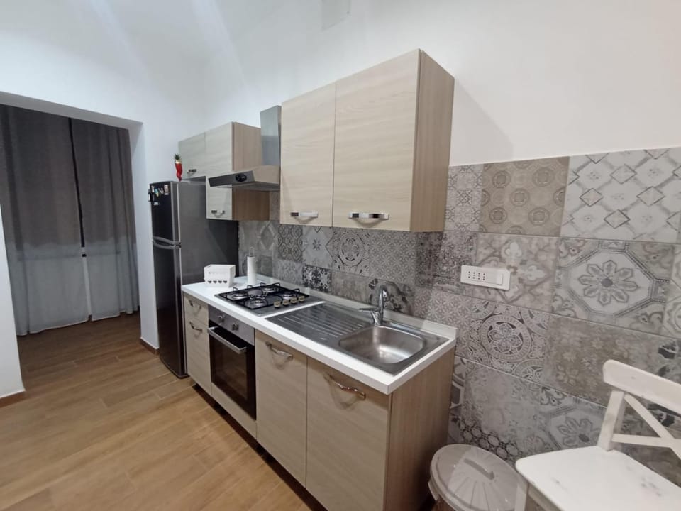 Kitchen or kitchenette, oven, stove