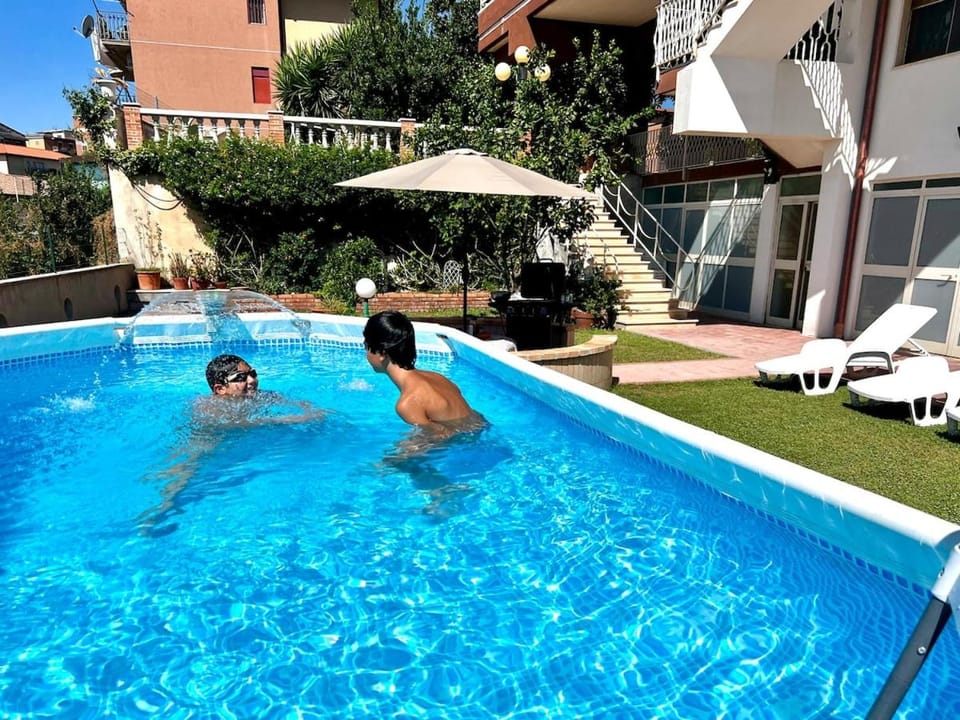Domus Apartment in villa, swimming pool and private parking Villa in Catania