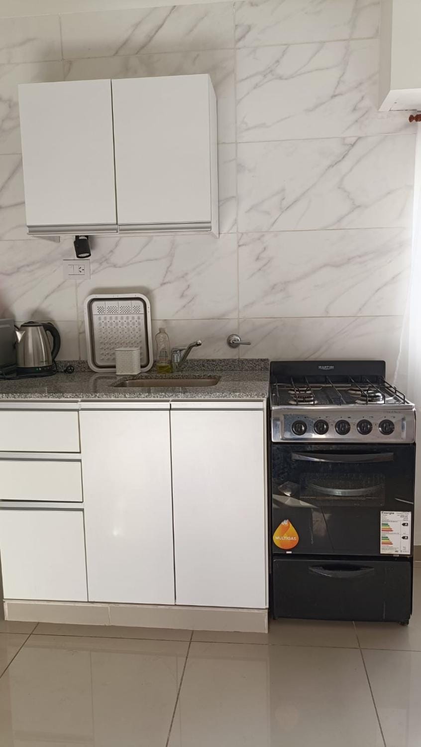 Kitchen or kitchenette, stove
