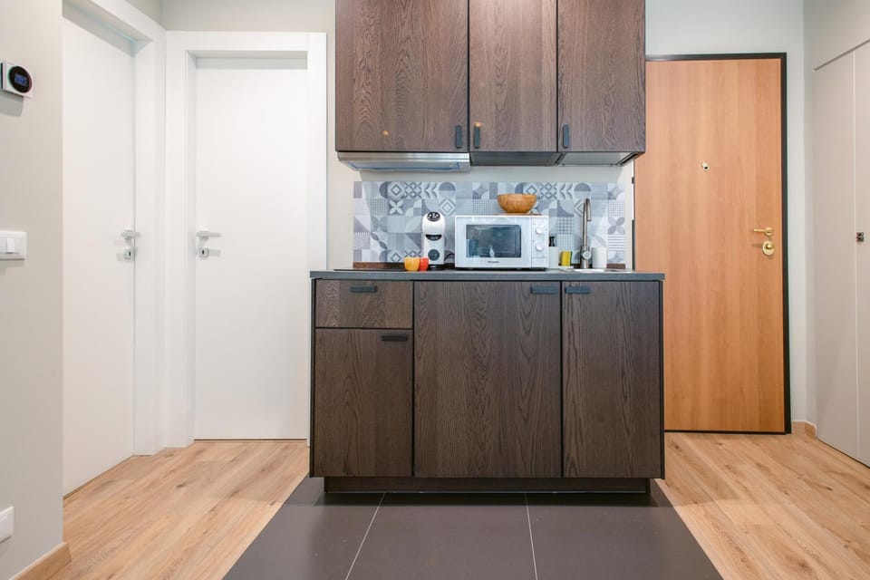 Kitchen or kitchenette, oven, stove