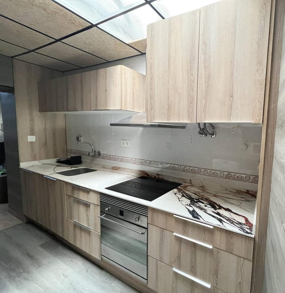 Kitchen or kitchenette, stove
