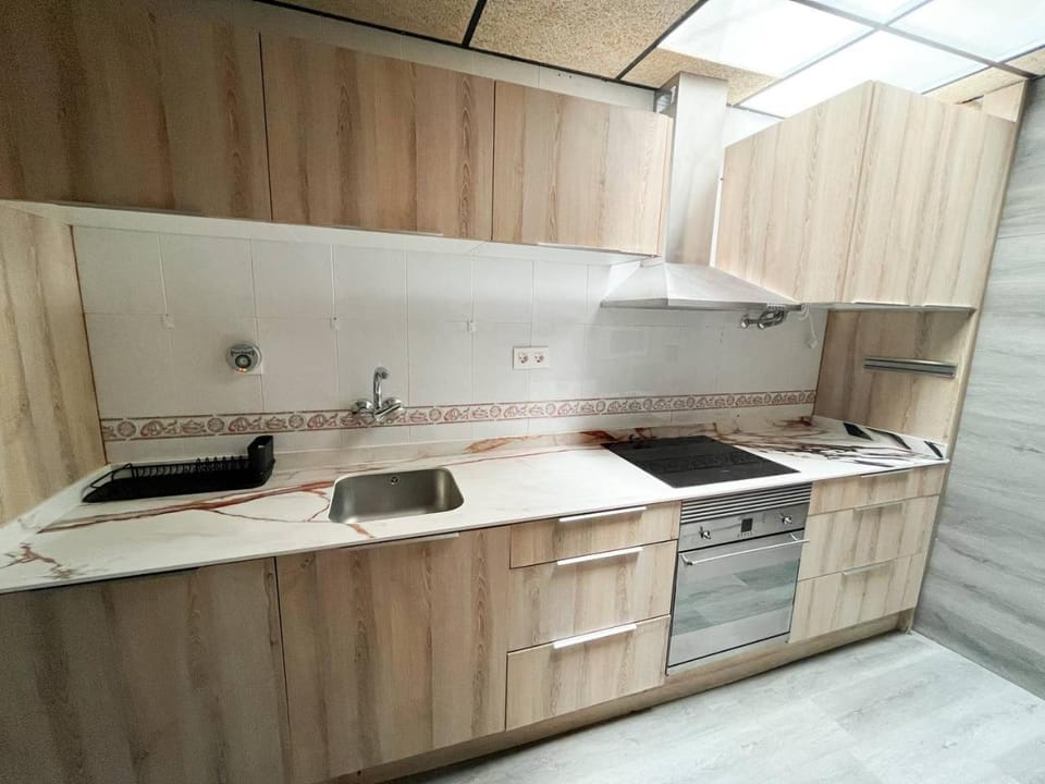 Kitchen or kitchenette, stove