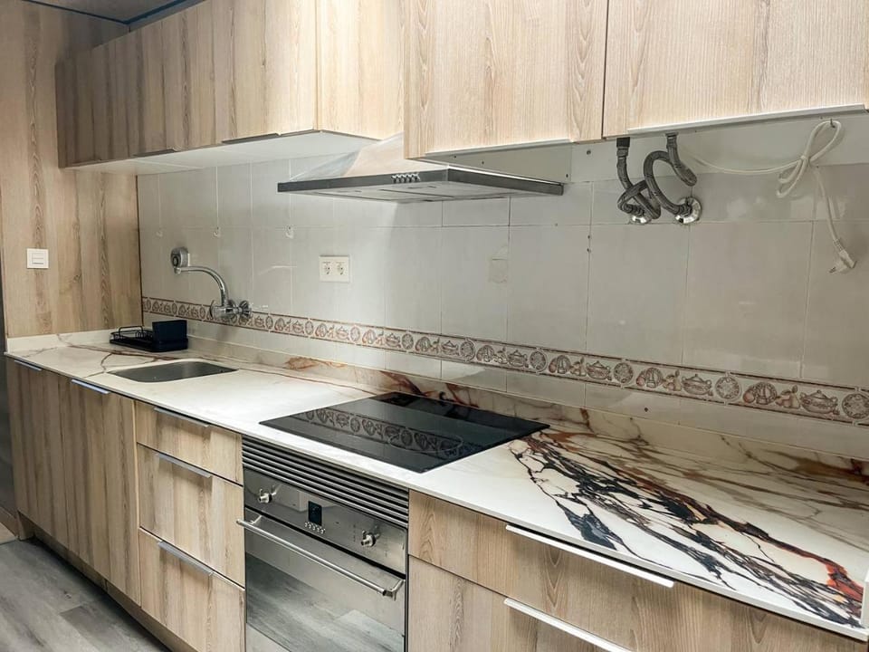 Kitchen or kitchenette, stove
