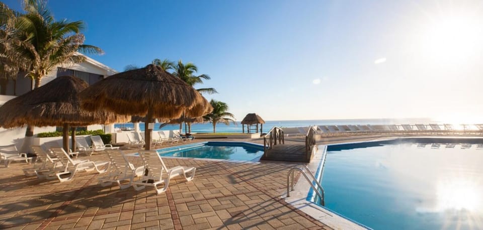 Patio, Day, Natural landscape, Beach, Pool view, Sea view, Swimming pool, Swimming pool, sunbed