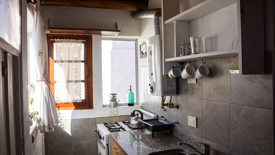 Kitchen or kitchenette, oven, stove