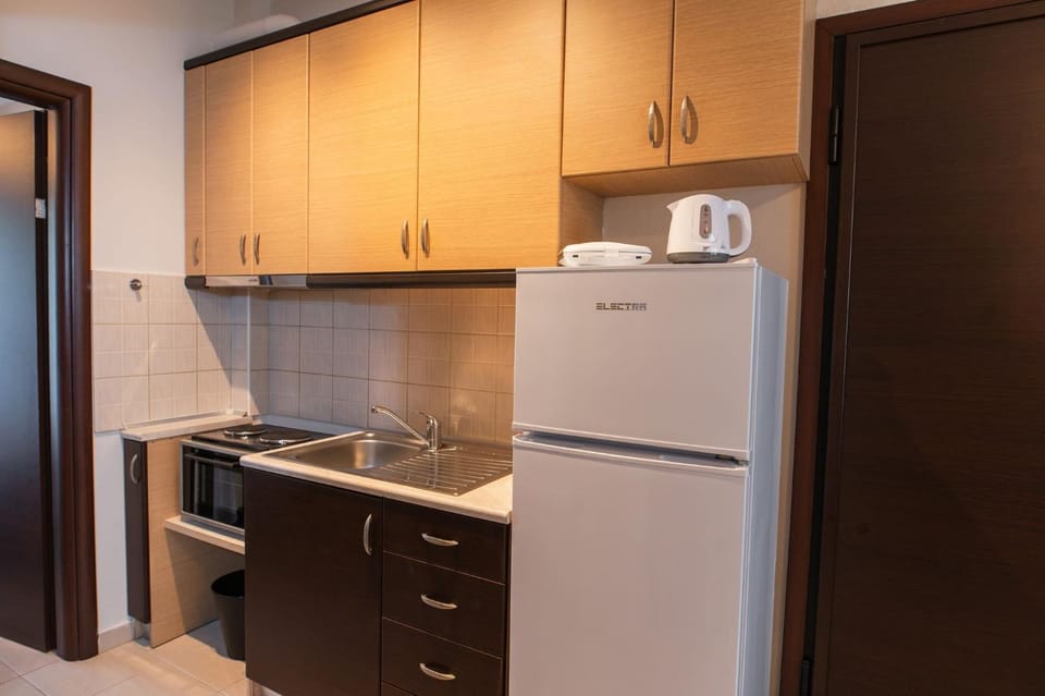 Kitchen or kitchenette, stove