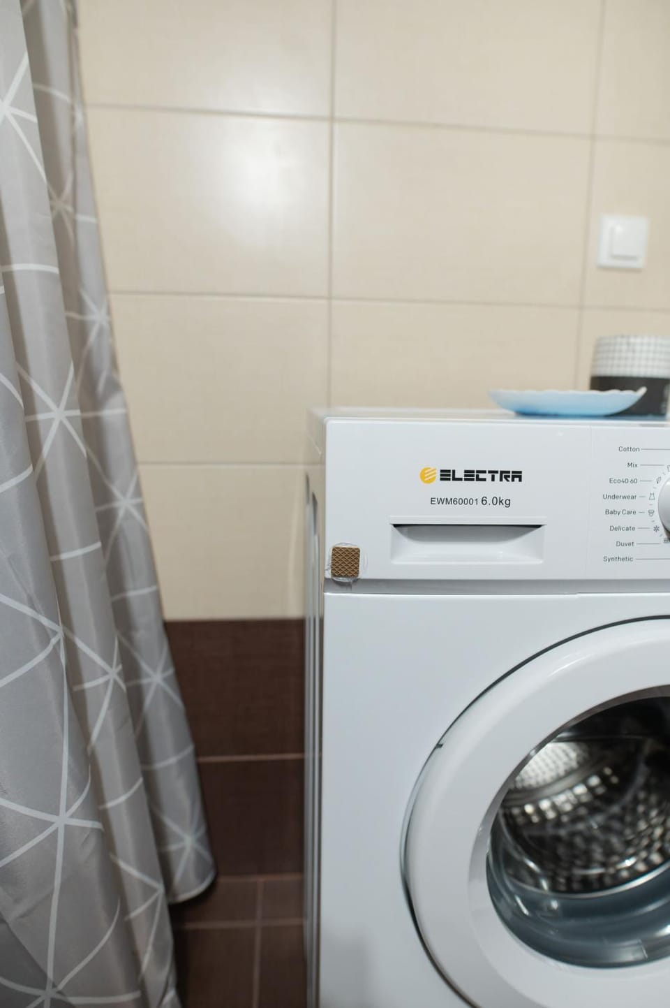 Bathroom, hair dryier, washing machine