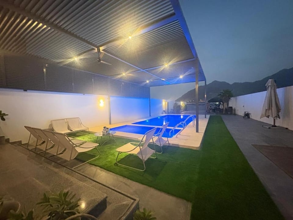 Night, Natural landscape, Seating area, Mountain view, Pool view, Swimming pool