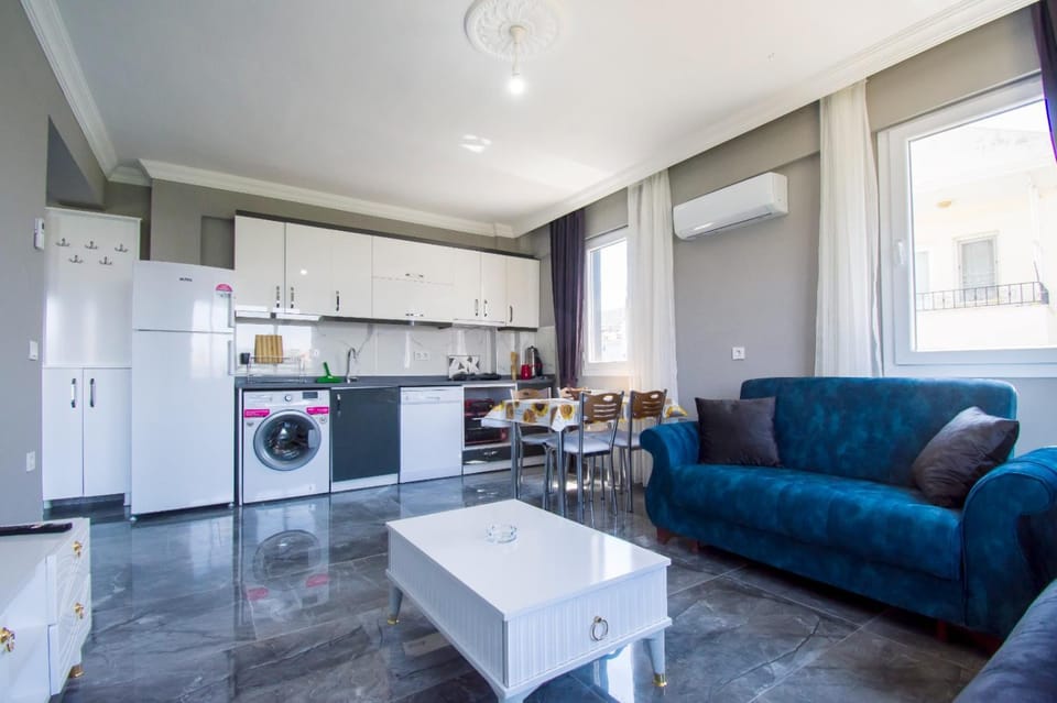 Kitchen or kitchenette, Living room, Seating area, Dining area, dishwasher, oven, stove
