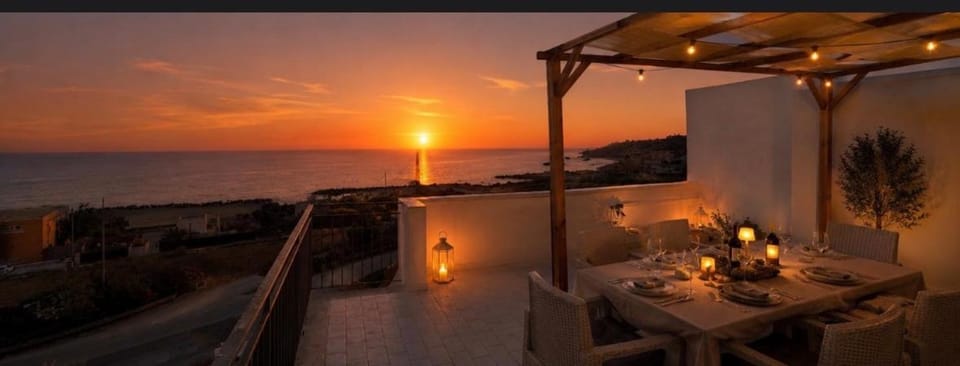 Property building, Natural landscape, View (from property/room), Balcony/Terrace, Dining area, Sea view, Sunset
