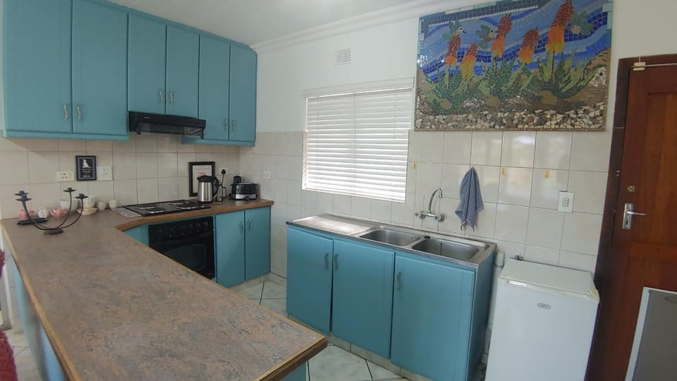 Kitchen or kitchenette, oven, stove, toaster