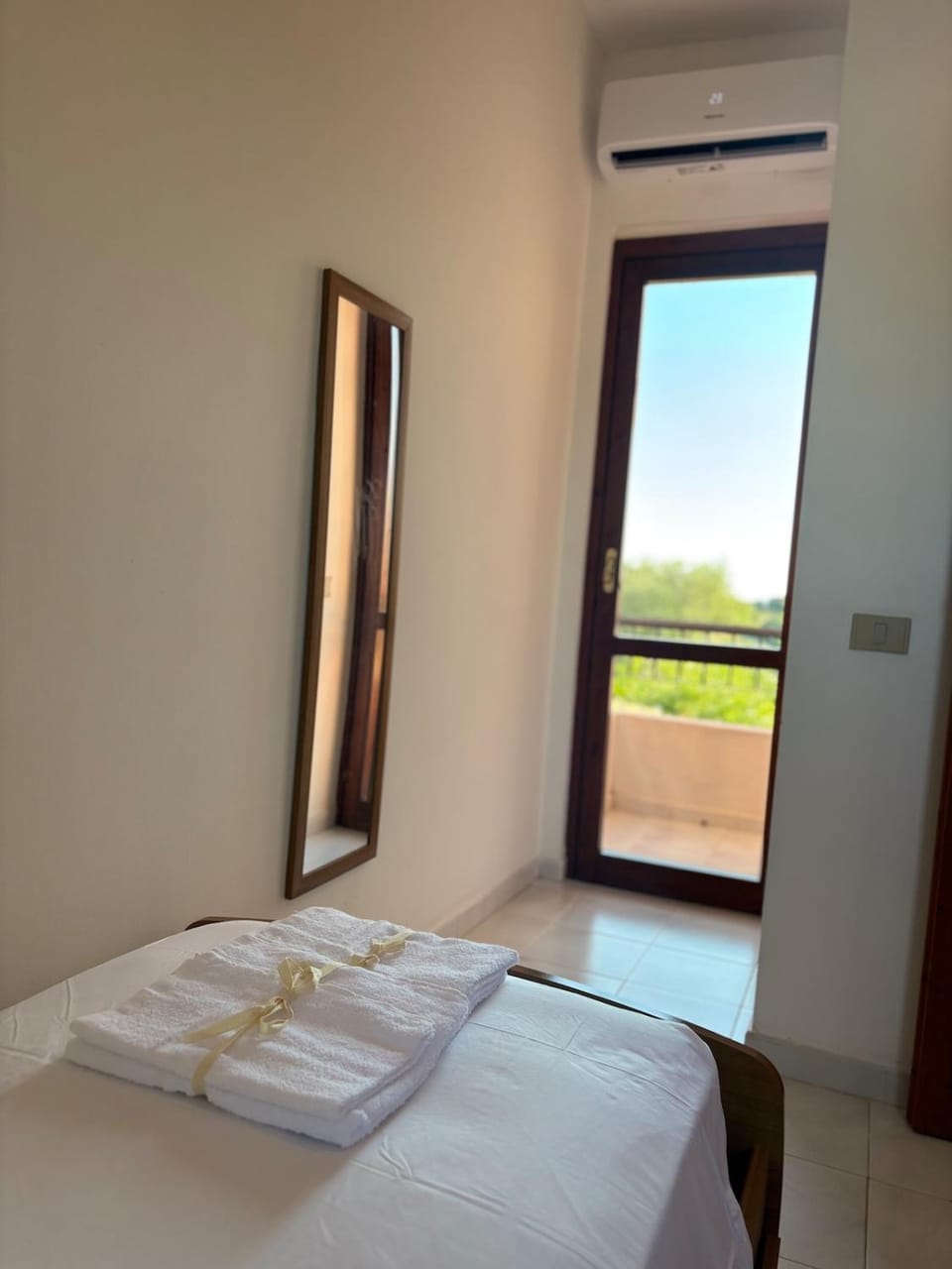 Photo of the whole room, Bedroom, towels, air conditioner