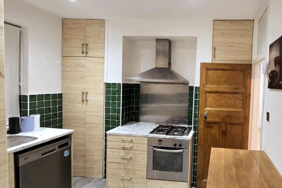 Kitchen or kitchenette, oven, stove