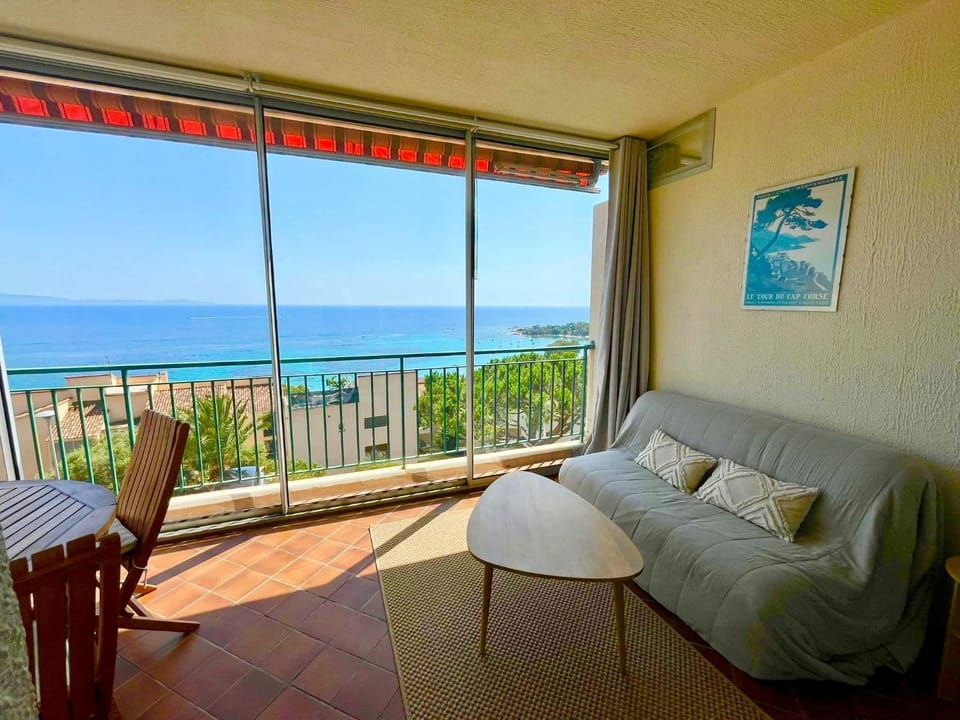 View (from property/room), Living room, Seating area, Sea view