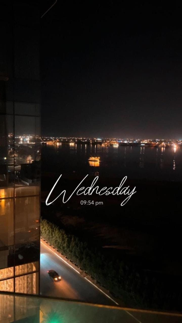 Property building, Night, View (from property/room), Balcony/Terrace, Text overlay, Street view