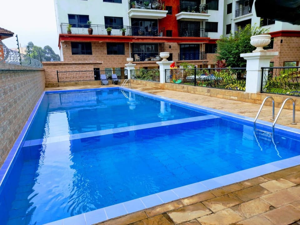 newly furnished three bedroom apartment with heated swimming pool fully equipped gym children playground ample parking space and unbeatable scenic city views Apartment in Nairobi