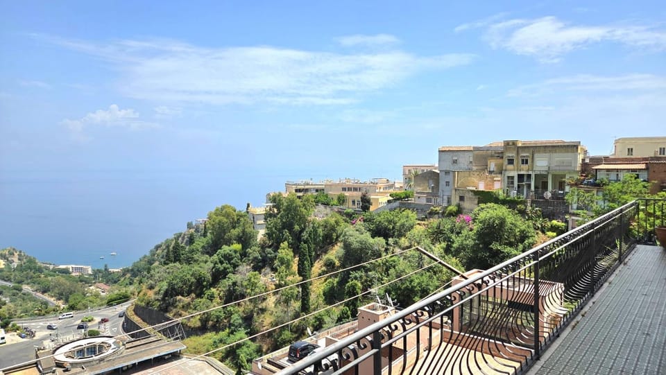 Property building, Nearby landmark, Natural landscape, City view, Sea view