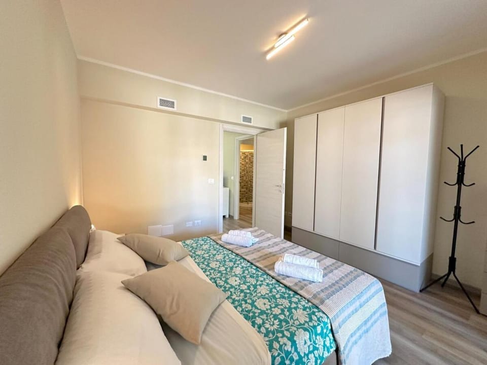 Bed, Photo of the whole room, Bedroom, towels, wardrobe