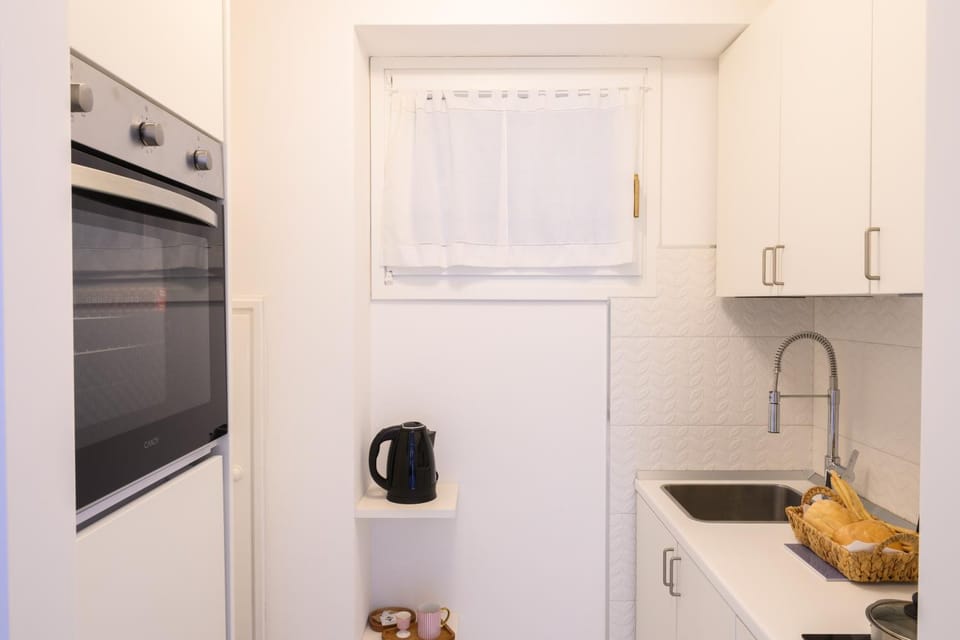 Kitchen or kitchenette, oven, stove