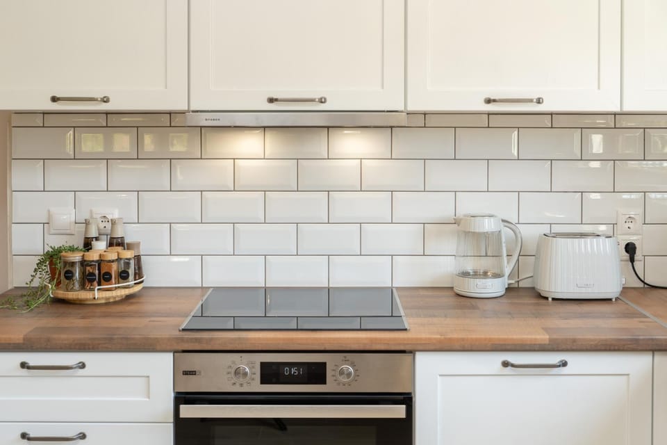 Kitchen or kitchenette, stove, toaster