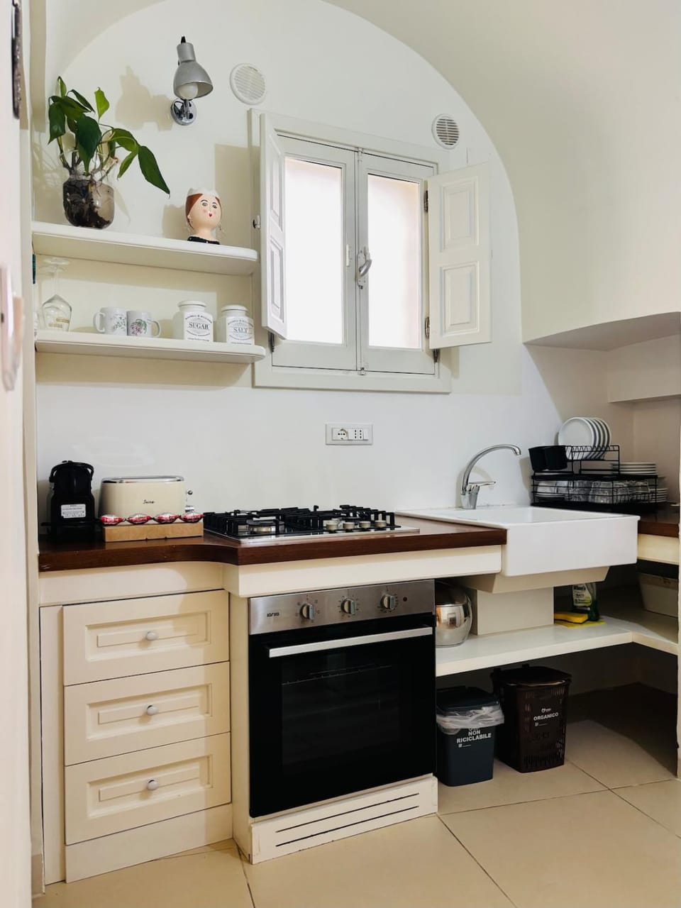 Kitchen or kitchenette, stove, toaster