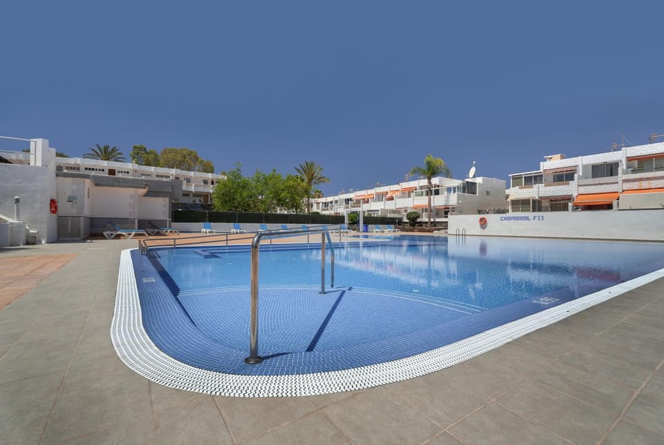 Property building, Living room, Swimming pool