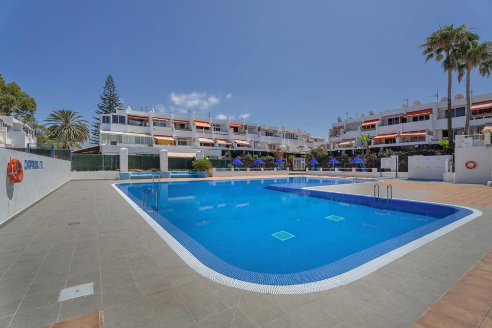 Property building, Living room, Swimming pool