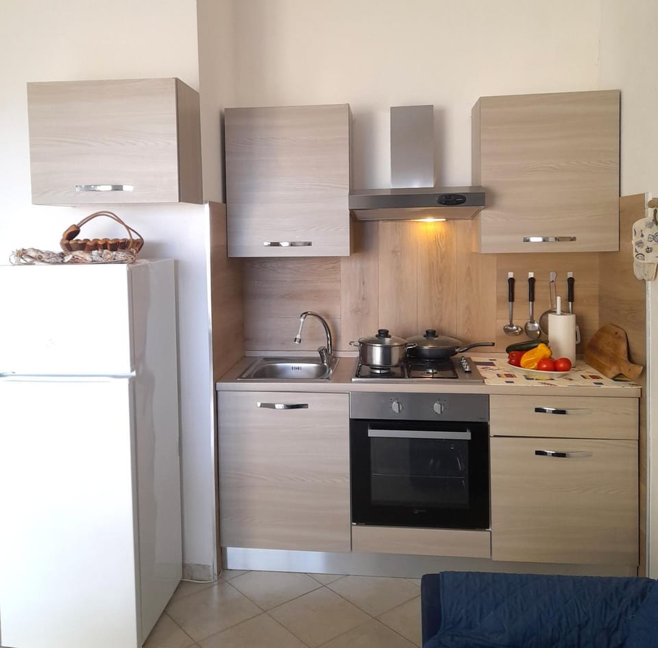 Kitchen or kitchenette, oven, stove