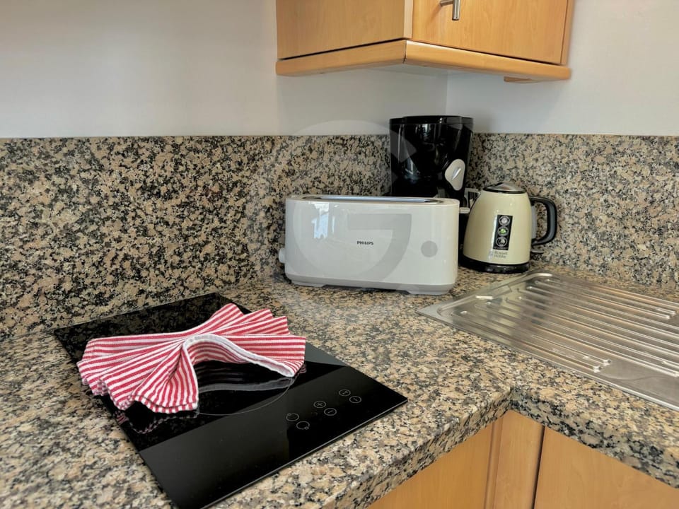 Kitchen or kitchenette, toaster