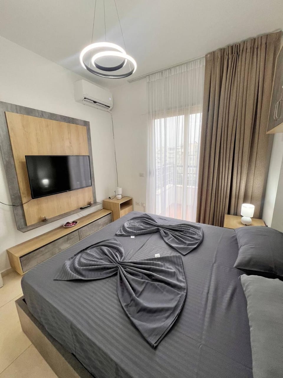 Neon waves apartment by Adriatic Living Apartment in Tirana County, Albania