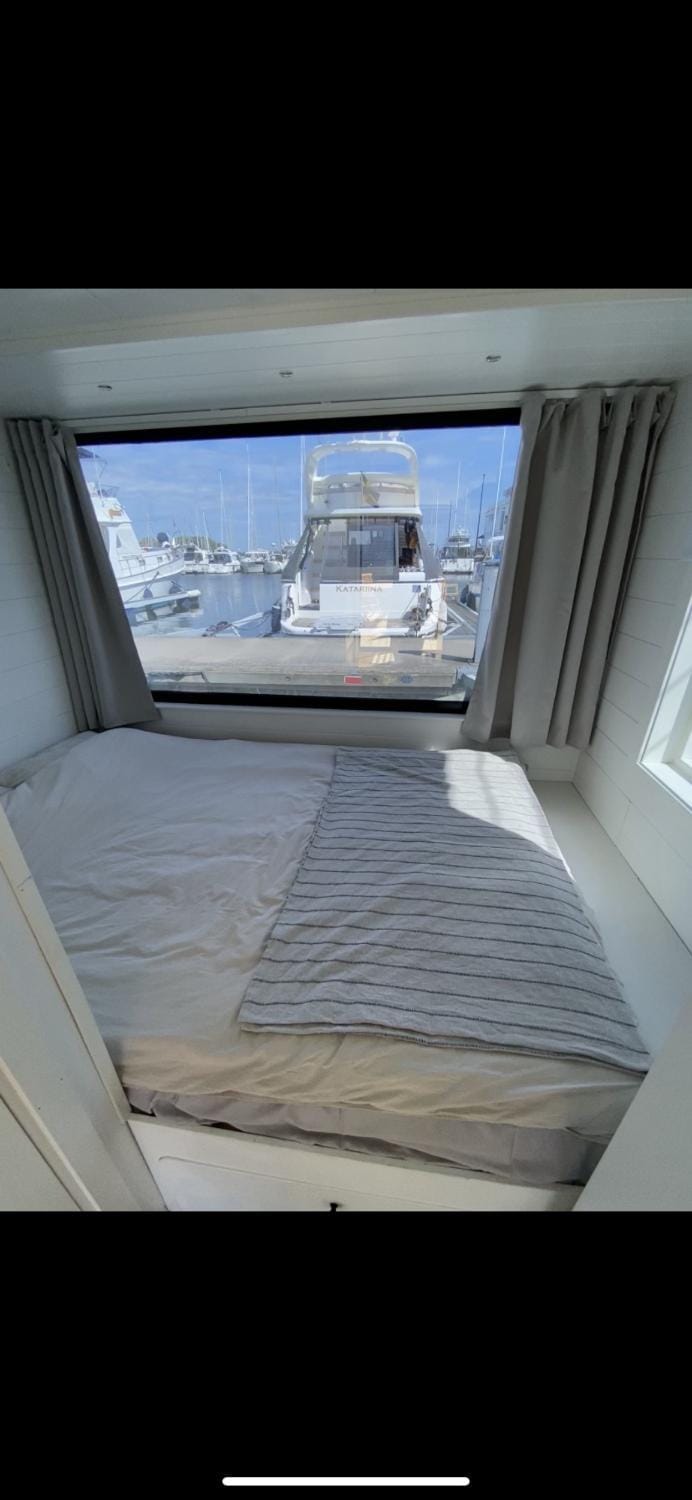 Houseboat in Karlskrona City Docked boat in Kalmar County, Sweden