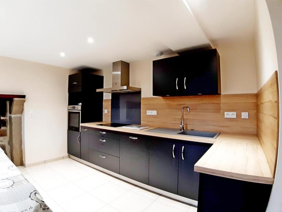 Kitchen or kitchenette, dishwasher, oven, stove