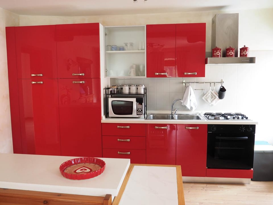 Kitchen or kitchenette, oven, stove