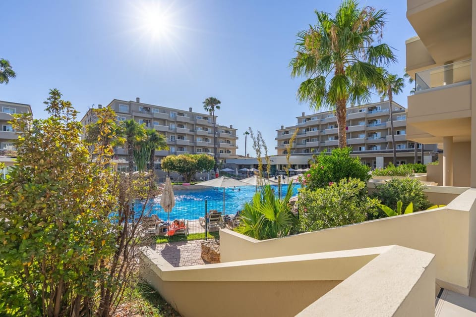 Property building, Living room, Swimming pool