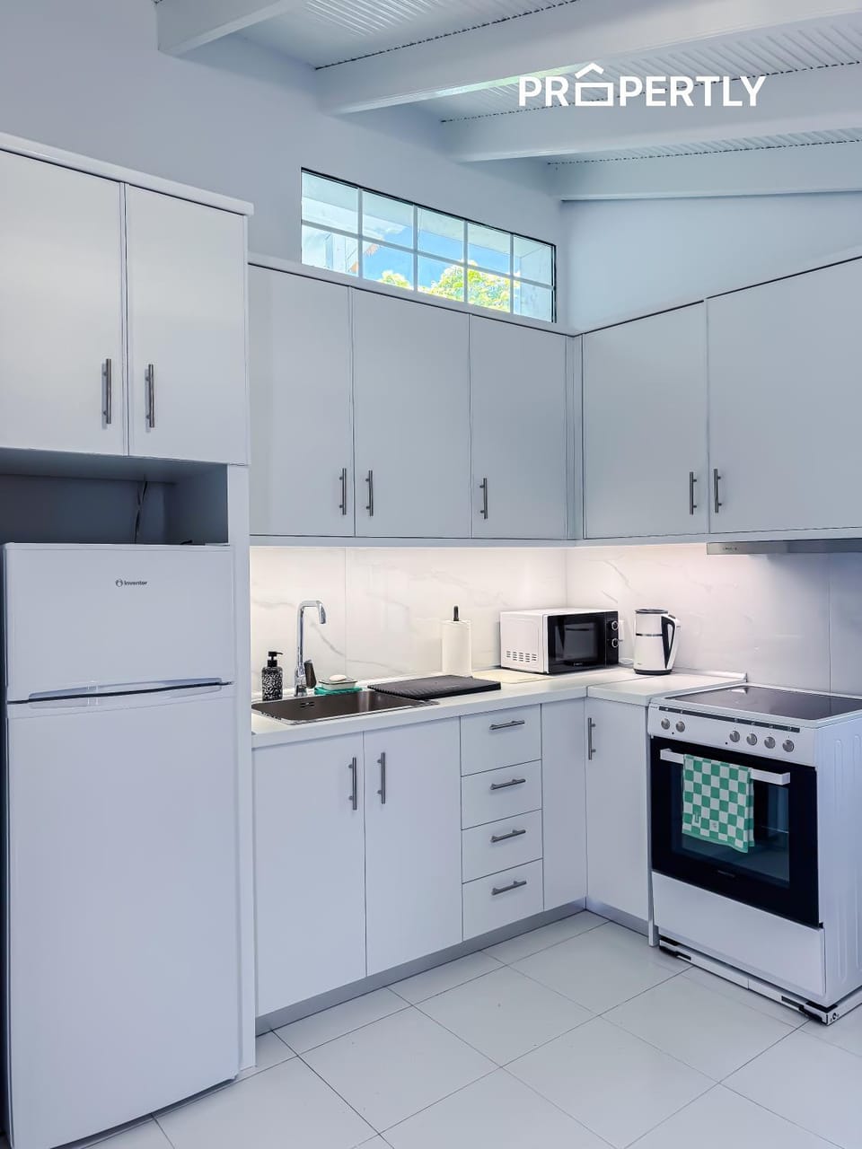 Kitchen or kitchenette, dishwasher, stove