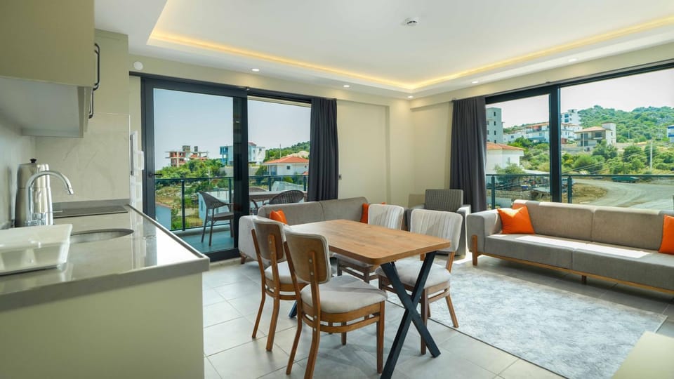 View (from property/room), Balcony/Terrace, Kitchen or kitchenette, Living room, Seating area, Dining area