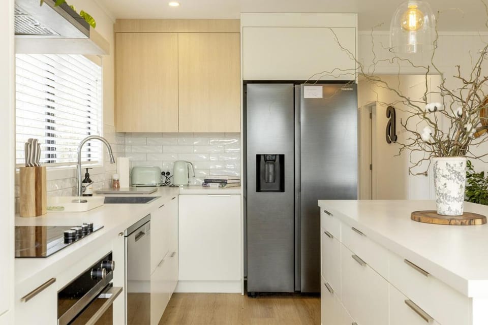 Kitchen or kitchenette, dishwasher, oven, stove, toaster