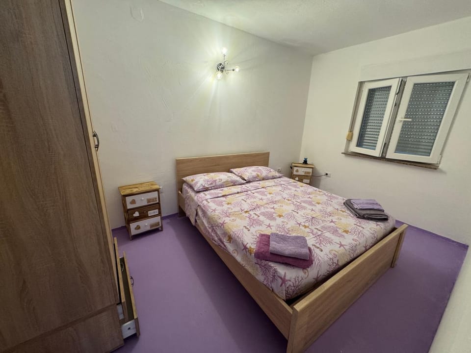 Bed, wardrobe