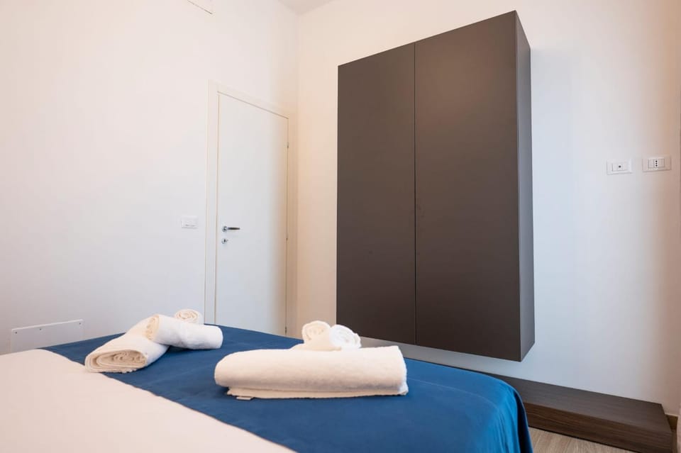 Bed, Photo of the whole room, Bedroom, towels, wardrobe