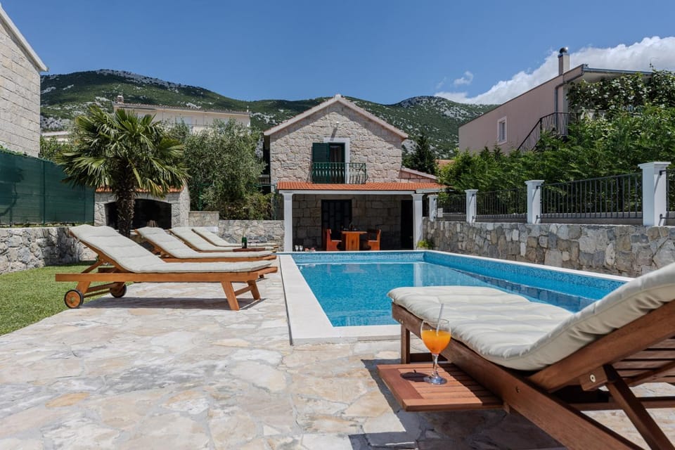 Property building, Patio, Spring, Day, Natural landscape, Mountain view, Pool view, Swimming pool, sunbed
