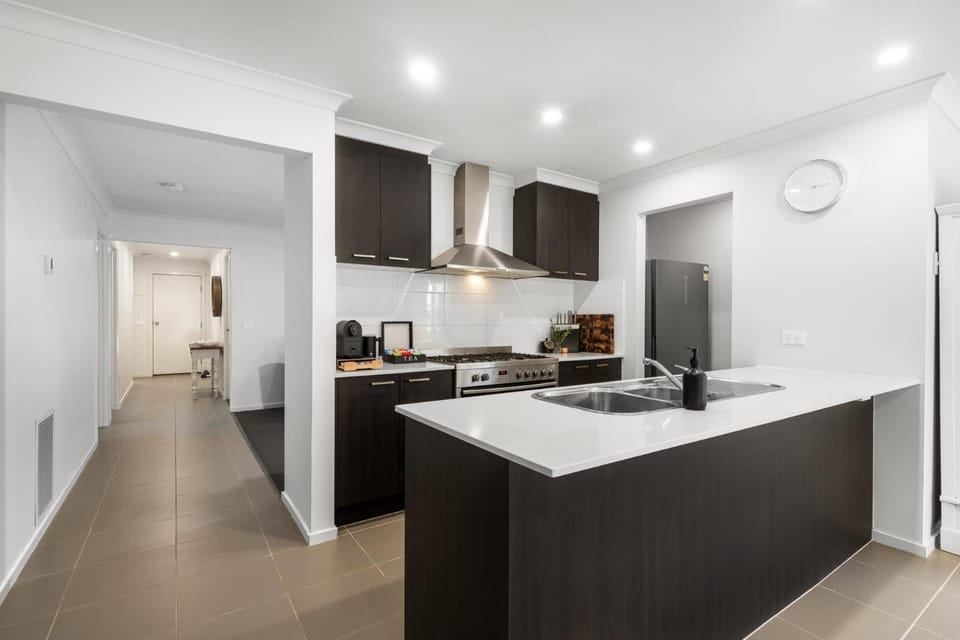 Kitchen or kitchenette, dishwasher, oven, stove, toaster