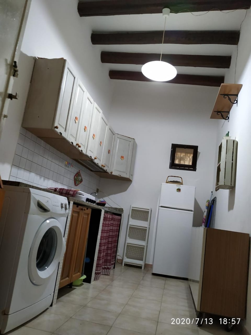 Kitchen or kitchenette, washing machine