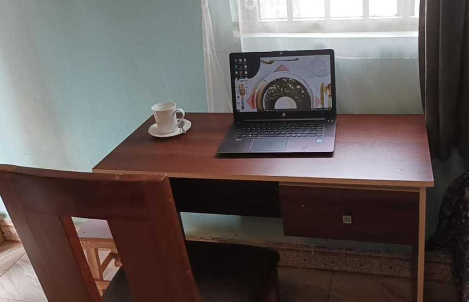 Private room wz full DStv Package, Patio & Kitchenette Bed and Breakfast in Kampala