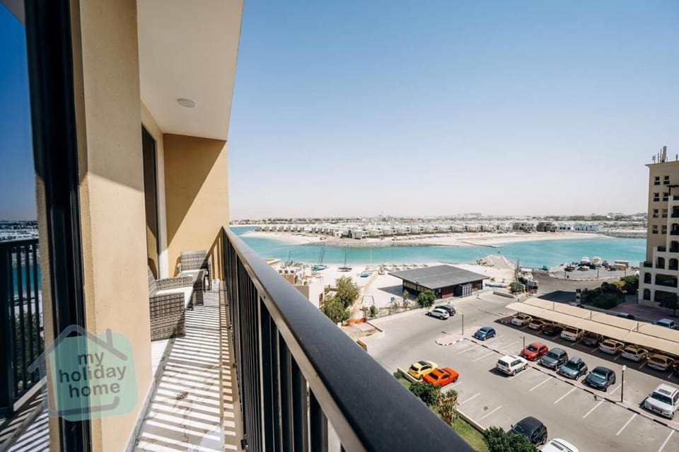 Private Beach 2BR-Yacht Club-WorkSpace-Pool-Gym Apartment in Ras al Khaimah