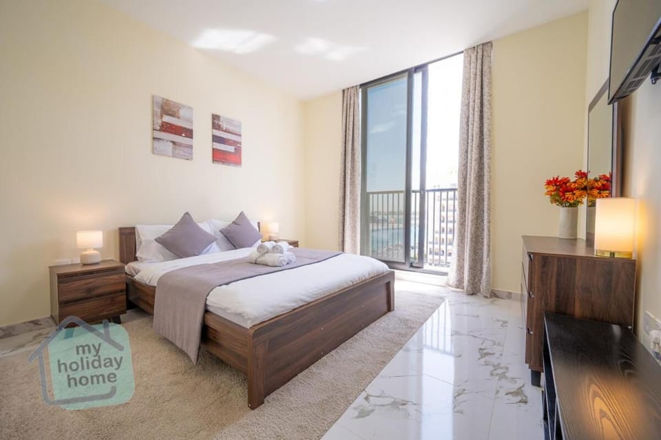 Private Beach 2BR-Yacht Club-WorkSpace-Pool-Gym Apartment in Ras al Khaimah